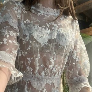 For love and lemons white sheer mock neck dress.